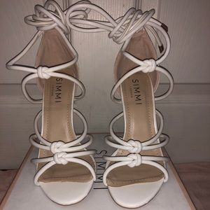 White strappy tie up heels